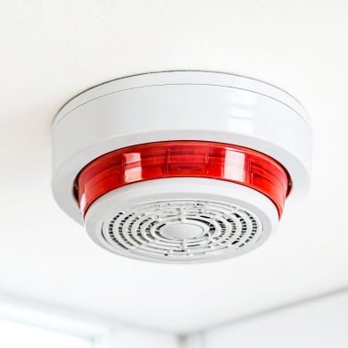 close up of smoke detector on ceiling